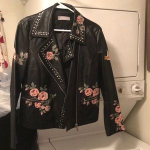 Black faux leather jacket.